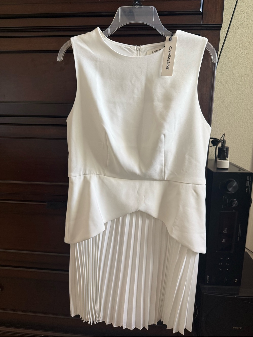Commense White Sleeveless Peplum Pleated-Hem Mini Dress
